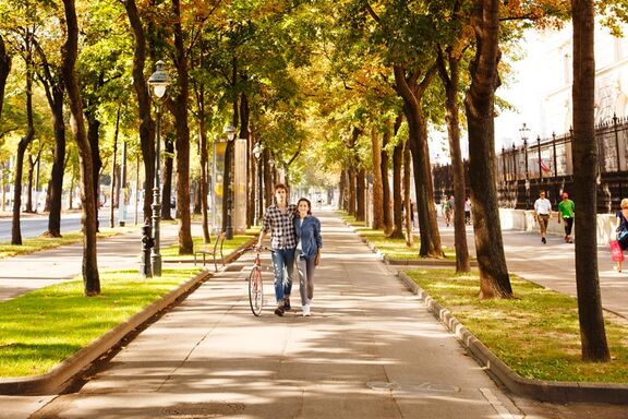 Couple with bike in town