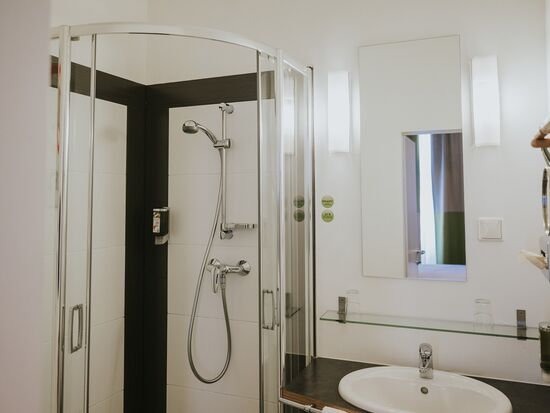 Bathroom with shower at our Main Building