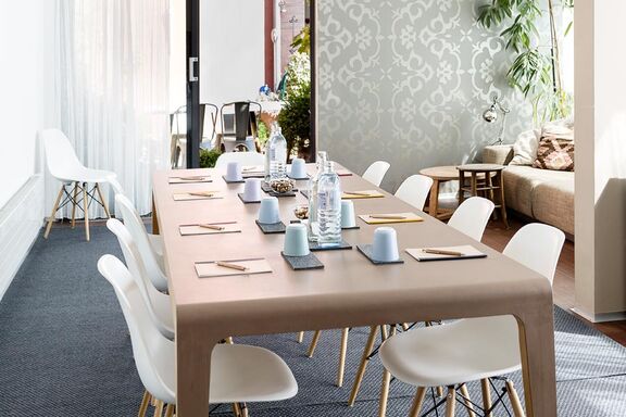 Desk with files and drinks