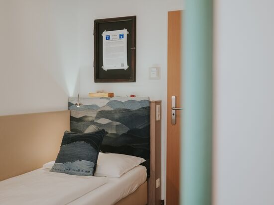 Bed in upcycling elements with topic SDG # 6 /  ©Franzi Schädel