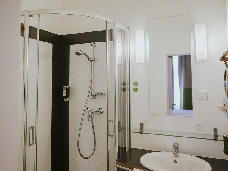 Bathroom with shower at our Main Building